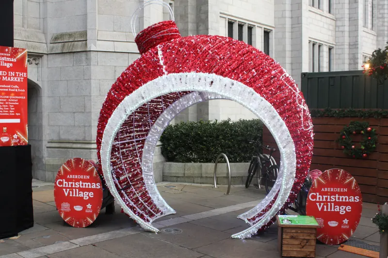 Giant illuminated bauble arch at the Aberdeen Christmas Village