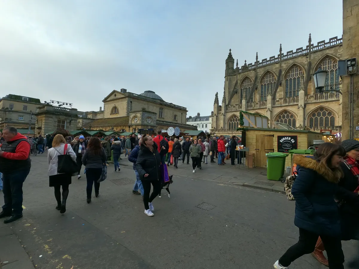 Christmas market stalls beside Bath Abbey