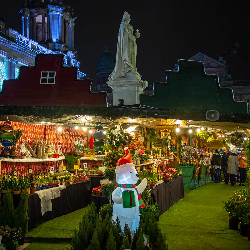 Belfast Continental Christmas Market stalls at night