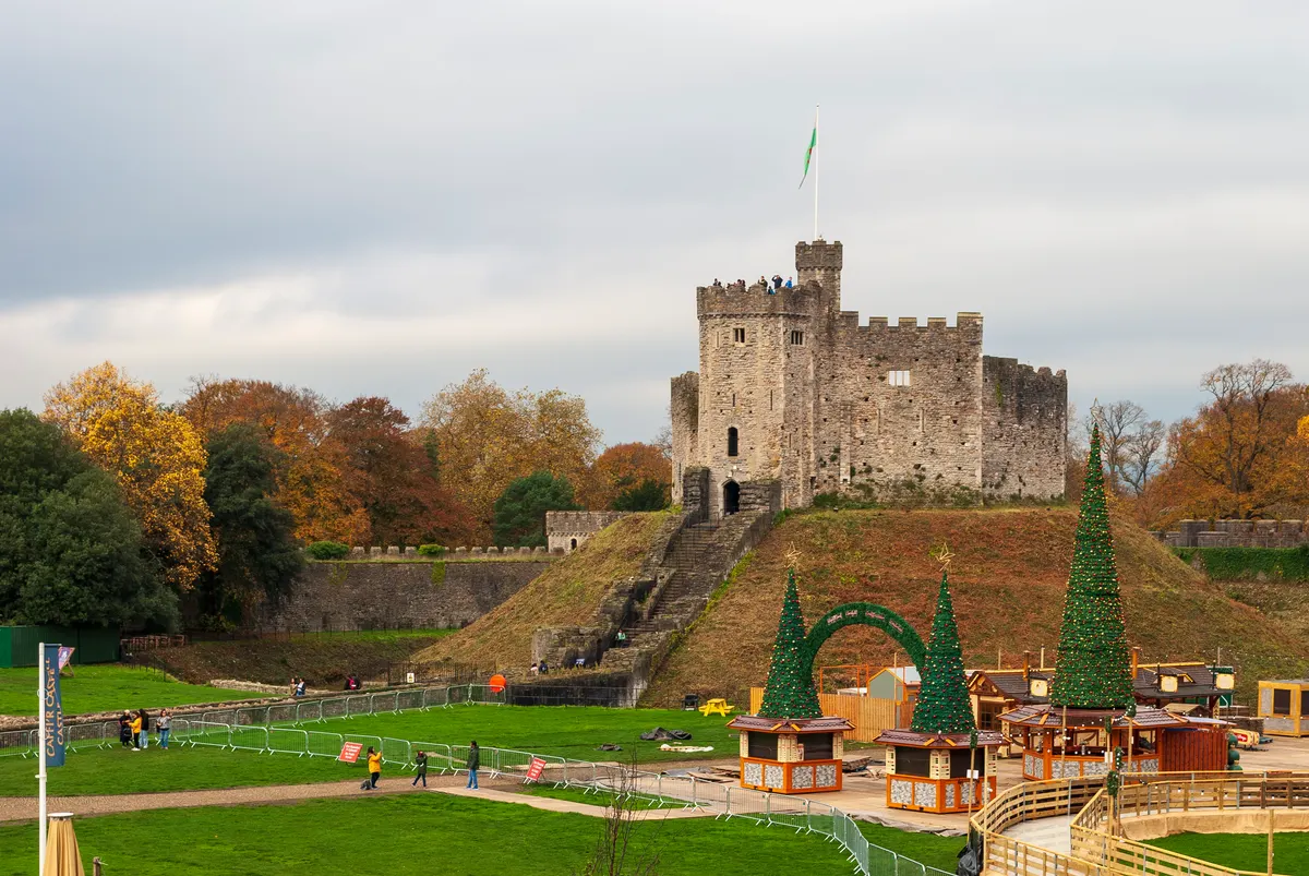 Cardiff Castle keep with Christmas trees and Winter Wonderland chalets