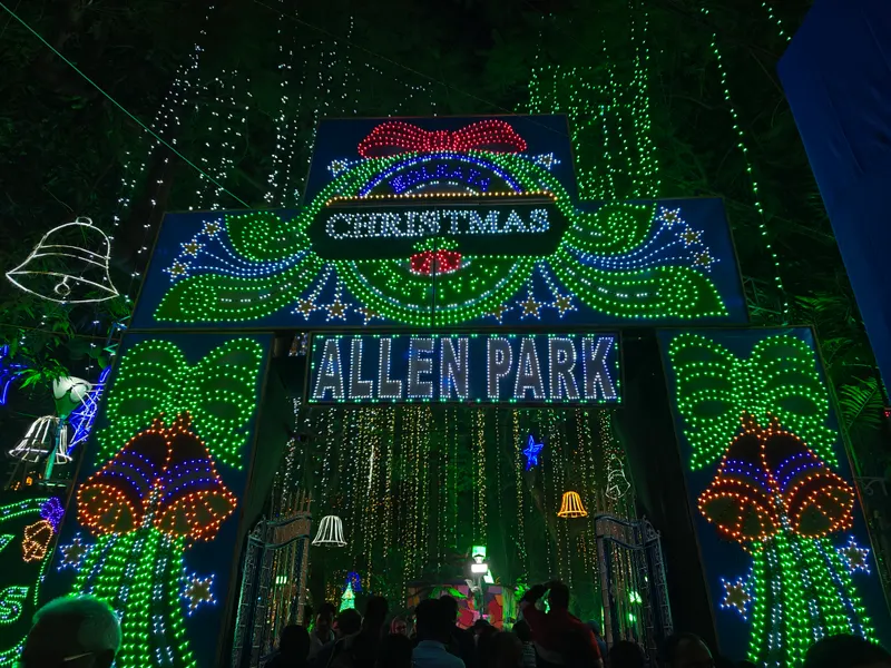 Green-lit Christmas arch at the Kolkata Christmas Festival entrance, Allen Park