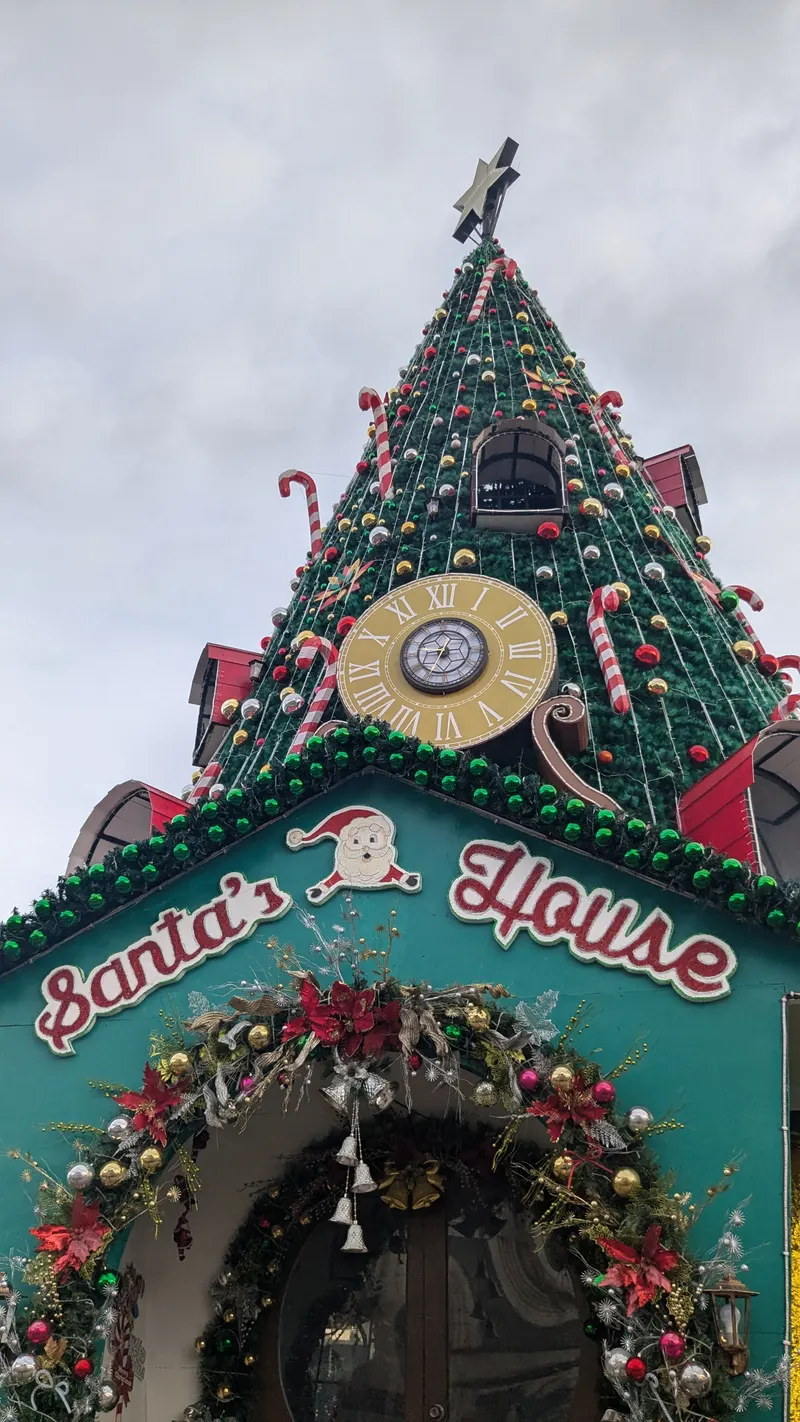 Clock and candy canes on the Santa's House Christmas tree in Mandaue